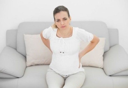 Почему болит спина после родов: основные причины и решения